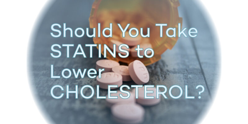 Pills Pouring From A Bottle With Caption Should You Take Statins To Lower Cholesterol