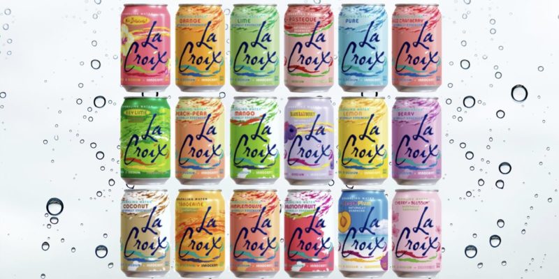 Variety Of La Croix Flavors Against A Bubbly Background
